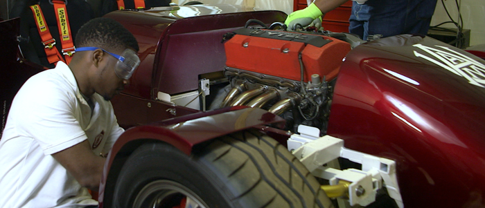 Students working on AAMU car